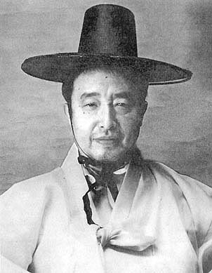 Nam June Paik in a traditional Korean dress